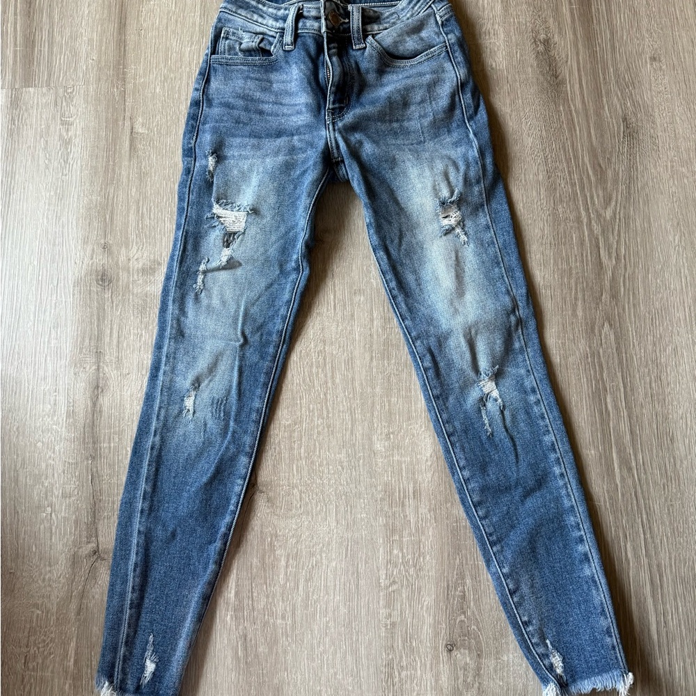 Distressed Blue Denim Jeans